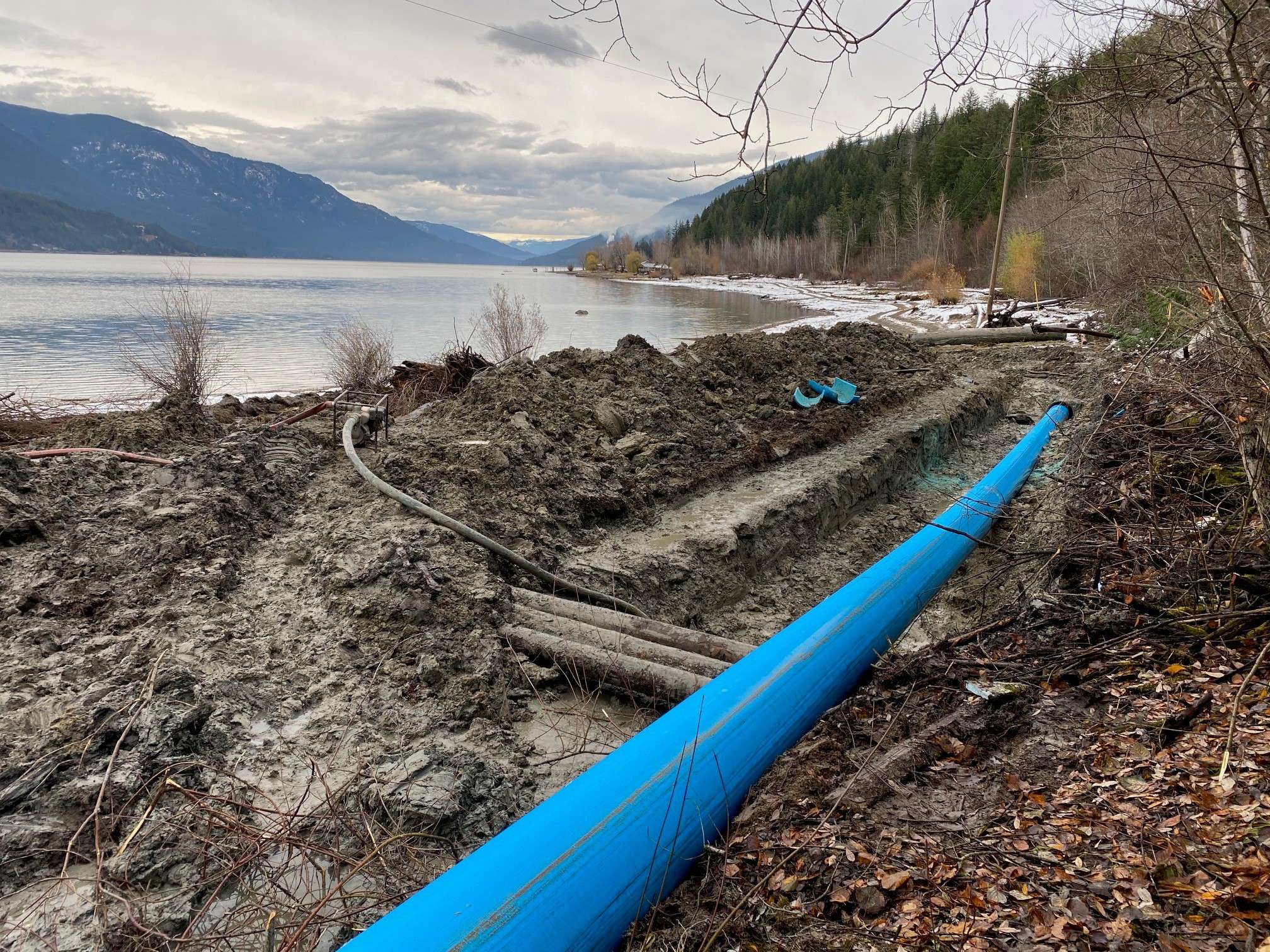 Fusible PVC pipe installation on the bank of a lake